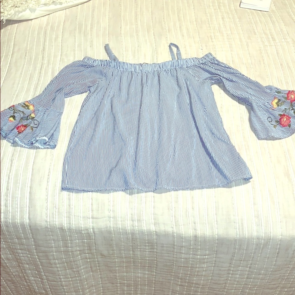 a open shoulder white and blue striped shirt